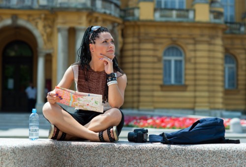 Tourist woman with map